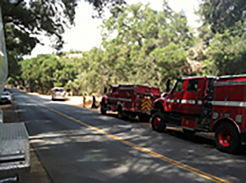 Photo of Fire Trucks tending the Adelaida fire.