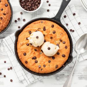 cast iron skillet cookie on a propane grill