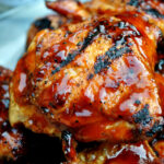 Barbecue chicken cooked on a propane grill