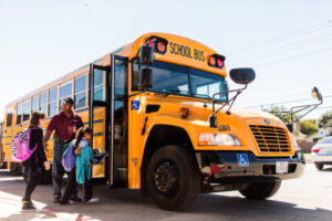 kids entering a propane school bus