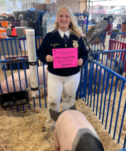 Alison Hopkins of Paso Robles FFA with her pig at 2023 California Mid-State Fair. Delta Liquid Energy supports local 4H and FFA youth every year.