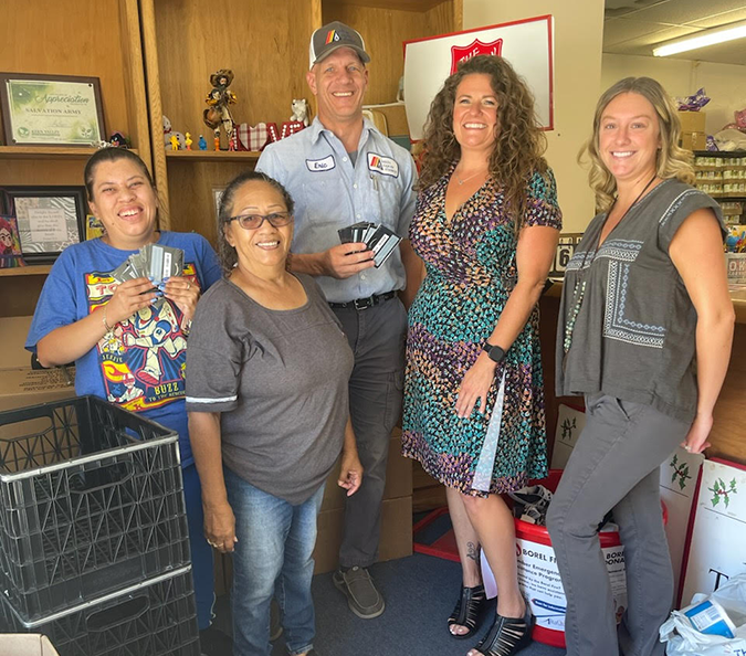 Delta Liquid Energy Lake Isabella Branch Manager Eric Moore and Customer Service Reps. Nicole Secrest and Fallan Cecil donating gift cards to Salvation Army for Borel Fire relief efforts