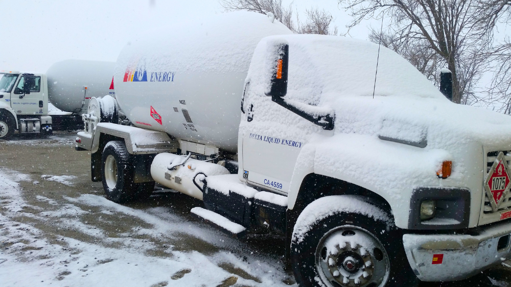 winter weather and snow affecting the propane supply chain - propane bobtail in the snow