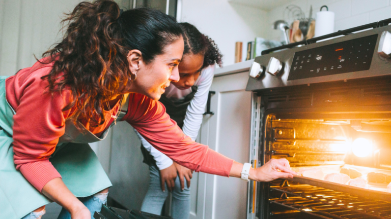 checking on cookies in oven, baking in propane oven