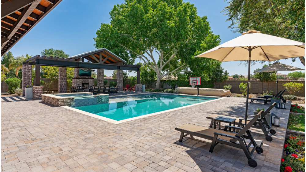 outdoor patio with pool and lounge area. Already Have Propane? These Summer Propane Upgrades May Be Easier Than You Think