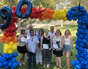 Delta Liquid Energy presenting awards to employees who have been with the company for 20 years or more at company 90th Anniversary part.