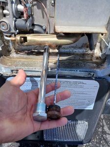 new RV water hater anode vs. 100% corroded anode