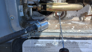 100% corroded RV water heater anode causing corrosion blockage in pipe or RV water heater